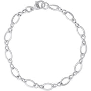 The Charm Bracelet by Rembrandt Charms is a 7-inch sterling silver piece featuring oval-shaped links and a lobster clasp. With its blend of large and small links, this bracelet offers a simple yet elegant design.