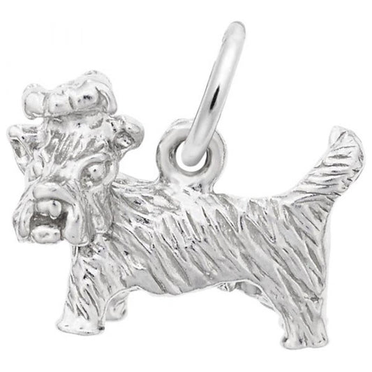 A close-up view of the Rembrandt Charms Yorkshire Dog Charm in sterling silver, showcasing a textured fur design. The charm includes a loop at the top for attaching to a chain or bracelet. The dog has a bow on its head, giving it a cute and playful appearance. This is part of the exquisite Rembrandt Charms collection.