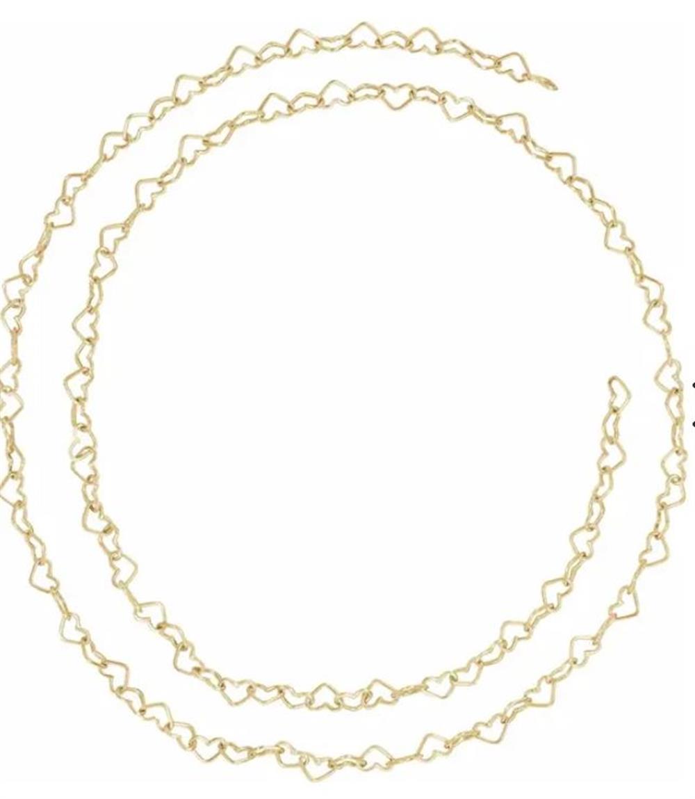 On a white background, the 14KY Heart Chain by Stuller-Stuller elegantly spirals with its intricate 3.2mm design, featuring small, evenly spaced hearts.
