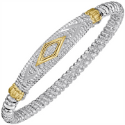 The 4mm Herringbone Diamond Statement Bangle by Alwand Vahan Jewelry features silver beading with gold accents and a diamond-shaped centerpiece. Its textured herringbone pattern and intricate details evoke the elegance of a statement bangle, making it a standout addition to your jewelry collection.