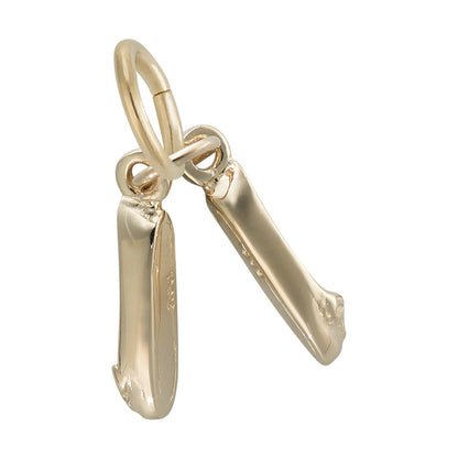 Introducing the Pair of Ballet Shoes Charm in gold plate from Rembrandt Charms—a delicate pendant featuring two ballet shoe charms hanging side by side from a circular loop, making an elegant dance gift that beautifully complements ballet slippers or other cherished keepsakes.