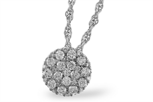 A close-up of the Allison Kaufman 14k white gold diamond disc pendant, showcased on a silver rope chain and adorned with sparkling clustered diamonds.