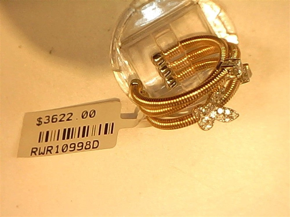A beautiful Coil Diamond Butterfly ring by Ryan Gems, crafted in 14k white and rose gold (size 6.5), features a diamond-studded bow charm. Displayed on a clear stand, the tag reads $3622.00, code RWR10998D.