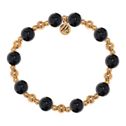 The Gold Day by Day Collection-Onyx Gemstone Bracelet by T Jazelle features alternating large black onyx and small gold beads plus a round gold "MS" charm—a stylish piece from the Day by Day Brace line.