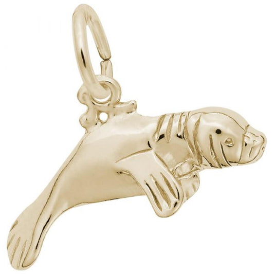 The Manatee Charm by Rembrandt Charms is a gold-plated sterling silver piece meticulously designed with detailed flippers, whiskers, and a curled tail. It features a small loop at the top for easy attachment to a bracelet or necklace. The charm's smooth and polished finish beautifully captures the playful essence of both seals and manatees.