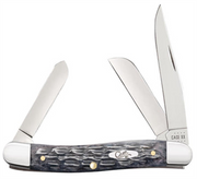 The pocket worn gray bone Crandall jig med by W.R. Case & Sons Cutlery Co. is a pocketknife with three open stainless steel blades and a dark gray bone handle in Crandall jig style, featuring metallic accents and "Case XX" engraved on one blade.