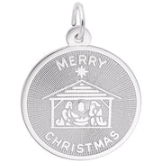 The Merry Christmas Nativity Charm from Rembrandt Charms is a sterling silver Christmas ornament, showcasing an engraved nativity scene with Mary, Joseph, and baby Jesus in a stable. The words "Merry Christmas" are engraved above and below the scene, accompanied by a prominent star at the top of the ornament.