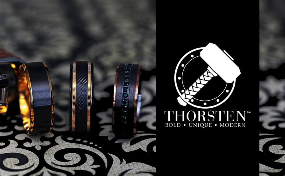 An array of Thorsten rings, including the Black Titanium Ring with Black Sapphires and those with Rose Gold Plated Edges, displayed on a patterned surface. The rings are made from various materials and showcase different designs. To the right is a black banner with the Thorsten logo featuring a hammer and the text: THORSTEN, BOLD, UNIQUE, MODERN.