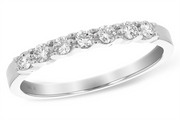 The Ladies Diamond 14k White Gold Wedding Ring by Allison Kaufman showcases a timeless elegance with its sleek, polished band and a row of seven uniformly spaced sparkling round diamonds set into the 14K white gold band that signifies purity.