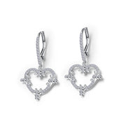 The Lafonn Filigree Heart Earrings are a pair of elegant, silver drop earrings featuring heart-shaped designs adorned with small, sparkling diamonds. These earrings showcase intricate filigree detailing, including delicate swirl patterns and tiny flowers, creating a sophisticated and refined look.