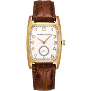 The Hamilton Boulton Quartz Watch features a rectangular, gold-toned case with a white dial and a brown crocodile-patterned leather strap. The dial includes Arabic numerals, gold-toned hour and minute hands, and a small seconds subdial at 6 o'clock. This American classic from Hamilton boasts Swiss accuracy.