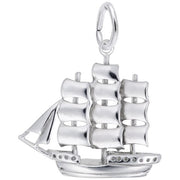 The Rembrandt Charms Sailboat Full Rigged Ship Charm in sterling silver is an exquisite piece featuring a traditional full-rigged ship design. It showcases three large sails on the main mast, smaller sails on the front mast, and intricate anchor detailing. The pendant is equipped with a loop at the top, making it easy to attach to a chain or bracelet.