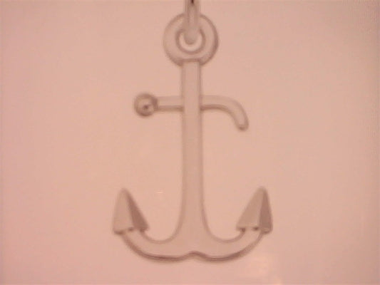 The Anchor Sterling Silver Charm by Rembrandt Charms features a simple, light anchor with two pointed flukes centered on a plain background, capturing the timeless elegance of sterling silver.