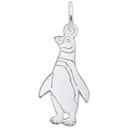 The Rembrandt Charms Penguin Charm in sterling silver is a detailed piece featuring engraved eyes, beak, and flippers, shaped like a standing penguin. It includes a small loop at the top for easy attachment to a necklace or bracelet.
