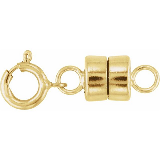The Stuller-Stuller Magnetic Clasp with Spring Ring 14 KY features a small, gold-colored round spring ring on one side and cylindrical magnetic ends that connect in the middle to form a complete clasp, making it ideal for securing jewelry pieces like necklaces or bracelets.