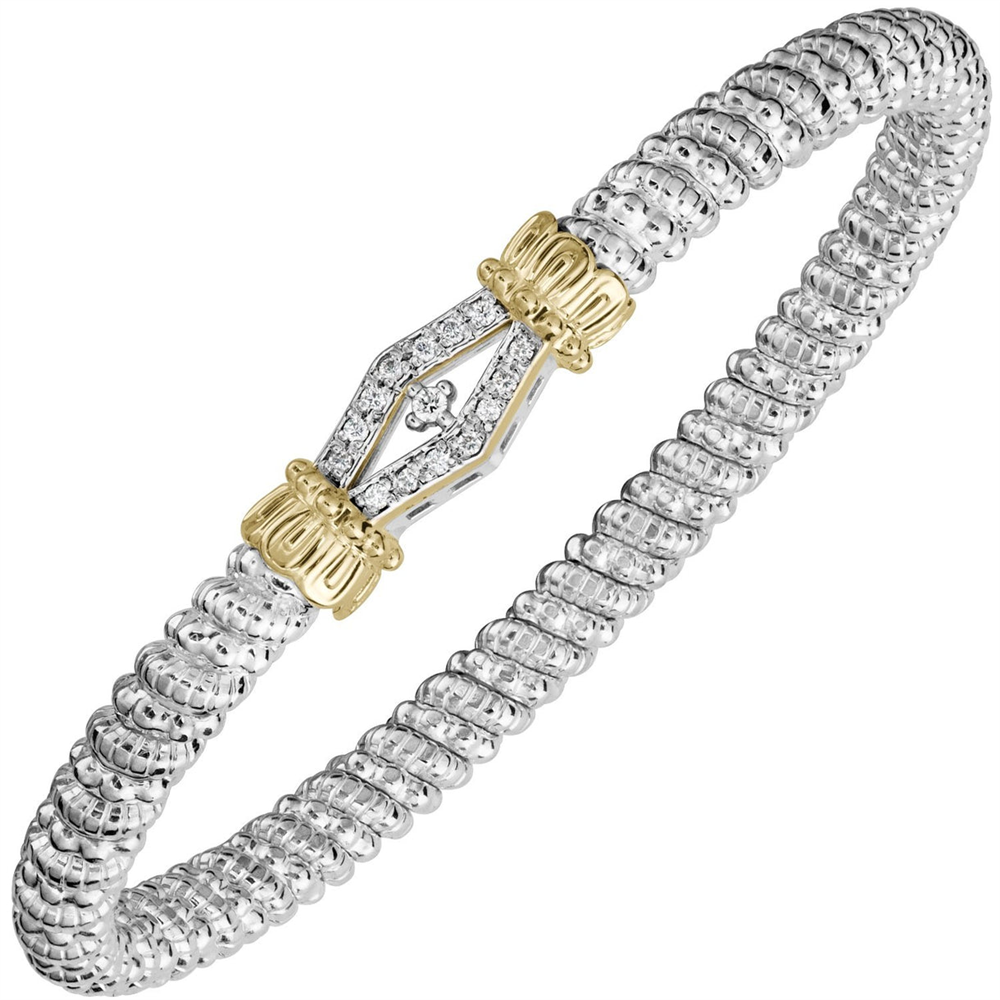 The 4mm Objecif Diamond Bangle Bracelet by Alwand Vahan Jewelry features a textured silver band with a gold and diamond-accented clasp at the center, showcasing a unique geometric design—an exquisite diamond bangle that brings refined elegance to any look.