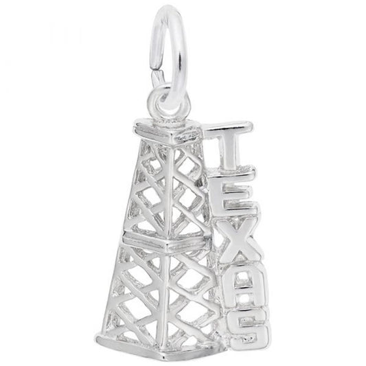 The Rembrandt Charms Texas Oil Rig Charm in sterling silver features a finely detailed oil derrick with the word "TEXAS" vertically engraved beside the structure in block letters. It includes a small loop at the top, perfect for attaching to a chain or bracelet.