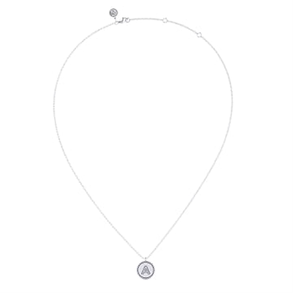The Gabriel & Co 925 Sterling Silver Bujukan Diamond Initial A Necklace, featuring a round pendant with the letter "A" at its center, is encased in a sparkly border inspired by Bujukan Diamond designs. This delicate piece includes an adjustable chain adorned with a small charm near the clasp, embodying simple elegance.