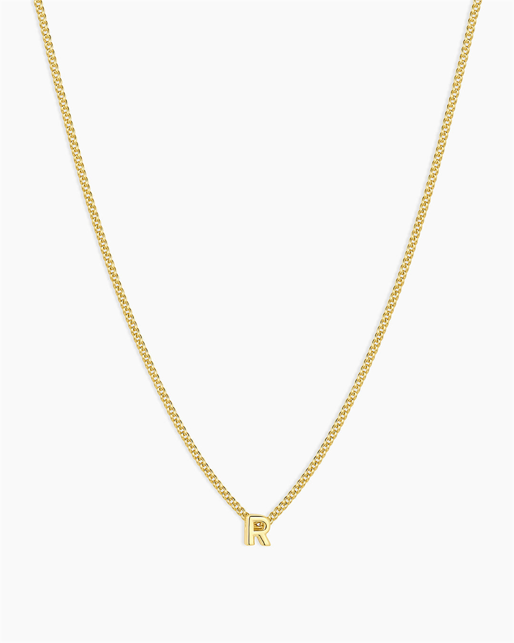 The Gorjana Wilder Mini Alphabet Necklace - R features an 18k gold plated, small "R" pendant at the center, shown on a plain white background—a perfect minimalist piece for daily wear.