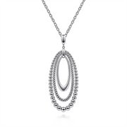 Gabriel & Co's 925 Sterling Silver Bujukan and Rope Circle Pendant Necklace from the Bujukan Collection features a stunning pendant with three nested oval loops: the innermost is plain, the middle is textured, and the outermost loop is adorned with small beads. Crafted from 925 Sterling Silver, the pendant hangs elegantly from a delicate silver chain.
