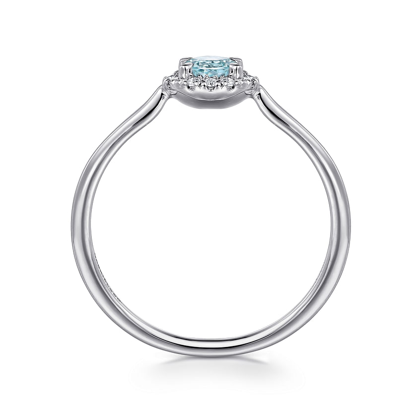 Gabriel & Co 14K White Gold Aquamarine and Diamond Halo Ring features a round aquamarine center and diamond halo, shown from the side against a white background.