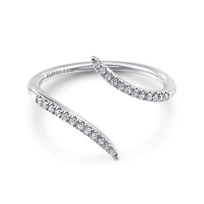 The 14K White Gold Bypass Open Diamond Ring by Gabriel & Co features two tapered, diamond-accented ends in a modern open design, with "Gabriel & Co." engraved inside.