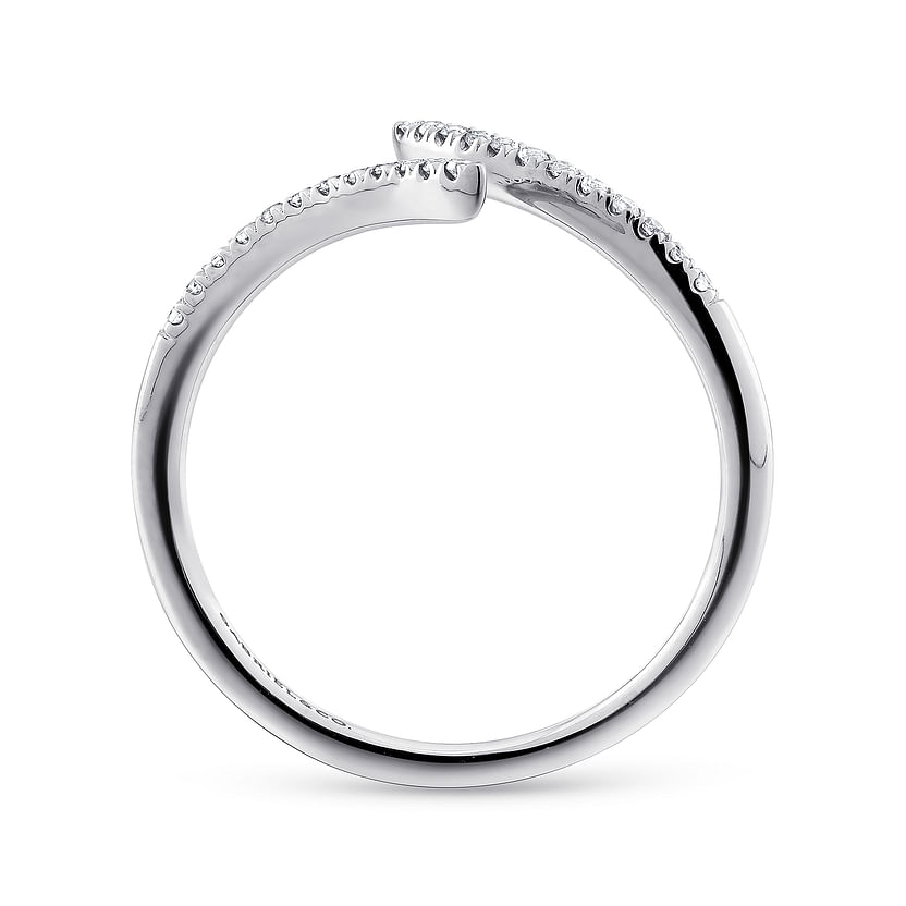 The Gabriel & Co 14K White Gold Bypass Open Diamond Ring features a modern open design with a row of small round diamonds set along one side of the band.