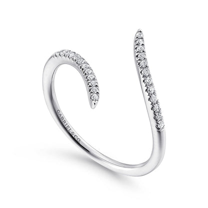 The Gabriel & Co 14K White Gold Bypass Open Diamond Ring features two tapered, diamond-encrusted ends and a sleek, modern design. This minimalist band is from the Kaslique Collection and engraved inside with "CARAT & CO".