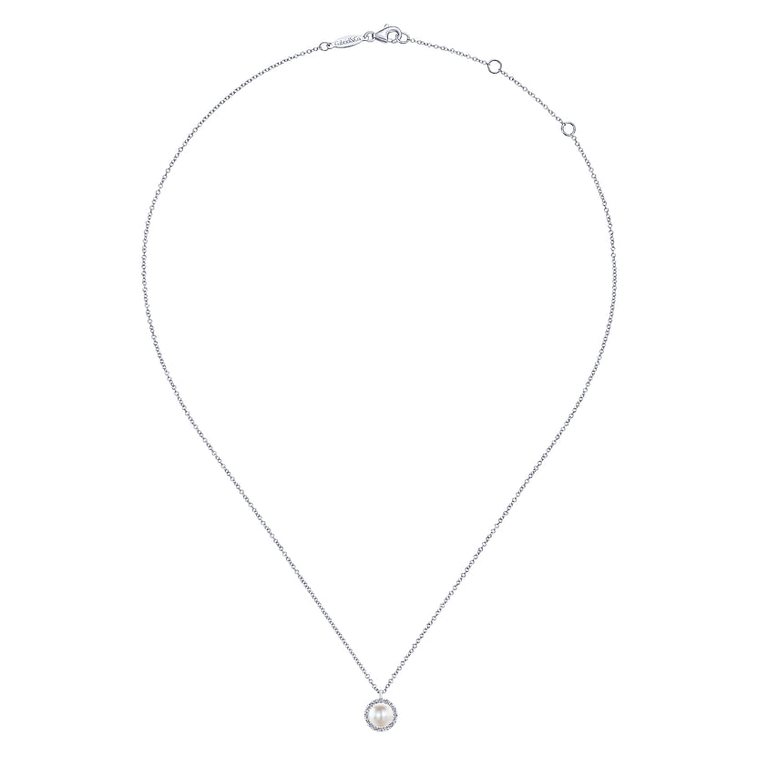 The Gabriel & Co 14K White Gold Cultured Pearl and Diamond Halo Pendant Necklace features a delicate chain with an adjustable clasp and a lustrous pearl pendant framed by sparkling diamonds.