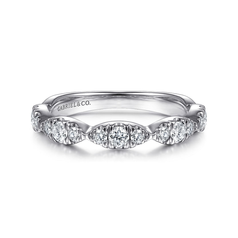 The 14K White Gold Diamond Cluster Marquis Station Ring by Gabriel & Co features round-cut diamonds in a vintage-inspired, stackable design, with "Gabriel & Co." engraved inside the band.