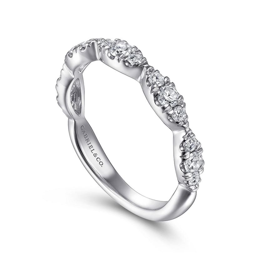 The 14K White Gold Diamond Cluster Marquis Station Ring by Gabriel & Co. features a curved, stackable design with marquis diamond clusters and an engraved inner band, shown on a white background.