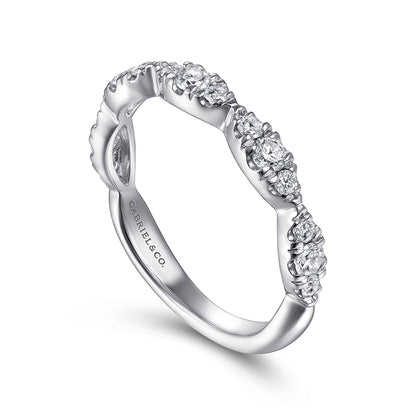 The 14K White Gold Diamond Cluster Marquis Station Ring by Gabriel & Co. features a curved, stackable design with marquis diamond clusters and an engraved inner band, shown on a white background.