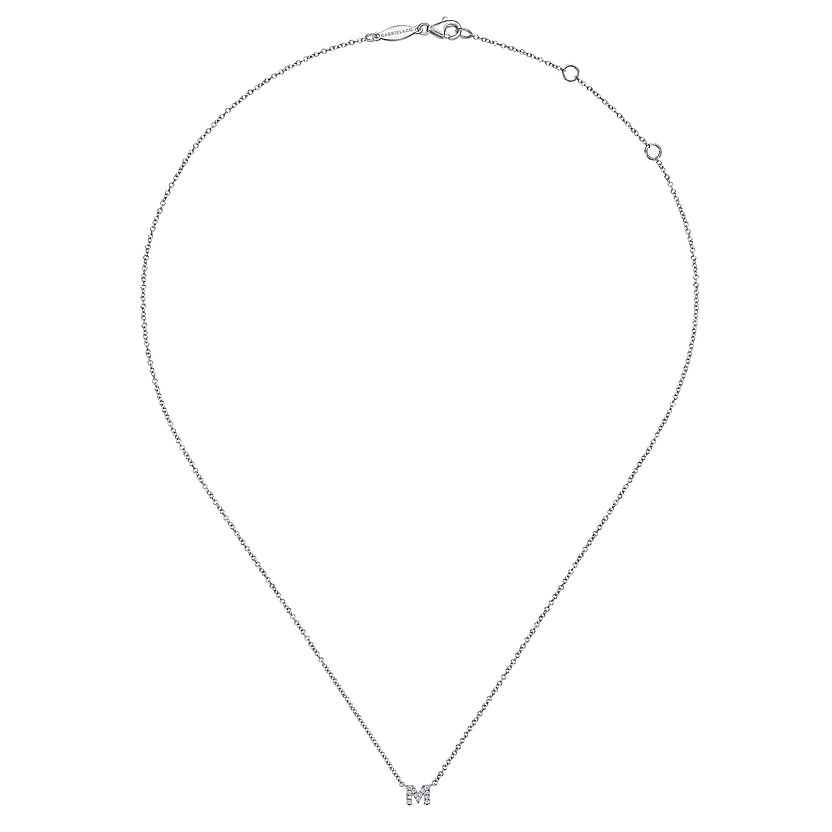 The Gabriel & Co 14K White Gold Diamond M Initial Pendant Necklace features a small, sparkling "M" pendant on a delicate chain, shown against a plain white background.