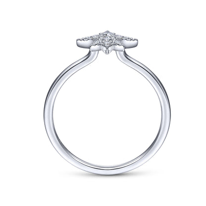 A side view of the Gabriel & Co 14K White Gold Diamond Starburst Ring, featuring a round center diamond and accent diamonds set in a celestial-inspired design.