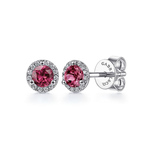 Gabriel & Co 14K White Gold Diamond and Pink Tourmaline Stud Earrings feature vibrant pink tourmaline centers with a diamond halo and secure butterfly backings.