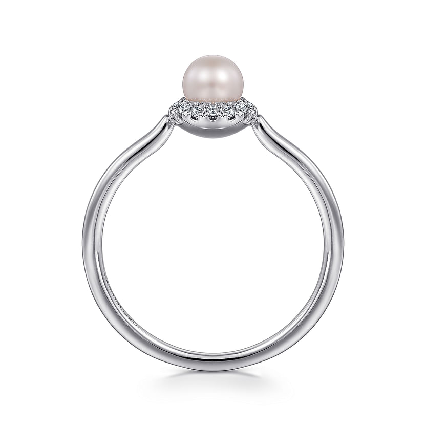 The Gabriel & Co 14K White Gold Pearl Ring with Diamond Halo showcases a single round pearl surrounded by sparkling diamonds, elegantly displayed against a white background.