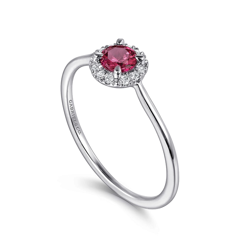 The Gabriel & Co 14K White Gold Pink Tourmaline and Diamond Halo Promise Ring features a round pink tourmaline center with a sparkling diamond halo, shown against a plain white background.
