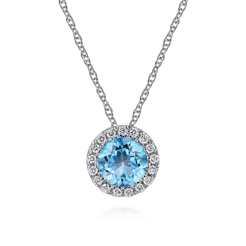 The Gabriel & Co 14K White Gold Round Swiss Blue Topaz and Diamond Halo Pendant Necklace features a round Swiss blue topaz encircled by diamonds on a delicate chain, shown against a white background.