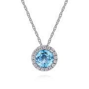 The Gabriel & Co 14K White Gold Round Swiss Blue Topaz and Diamond Halo Pendant Necklace features a round Swiss blue topaz encircled by diamonds on a delicate chain, shown against a white background.