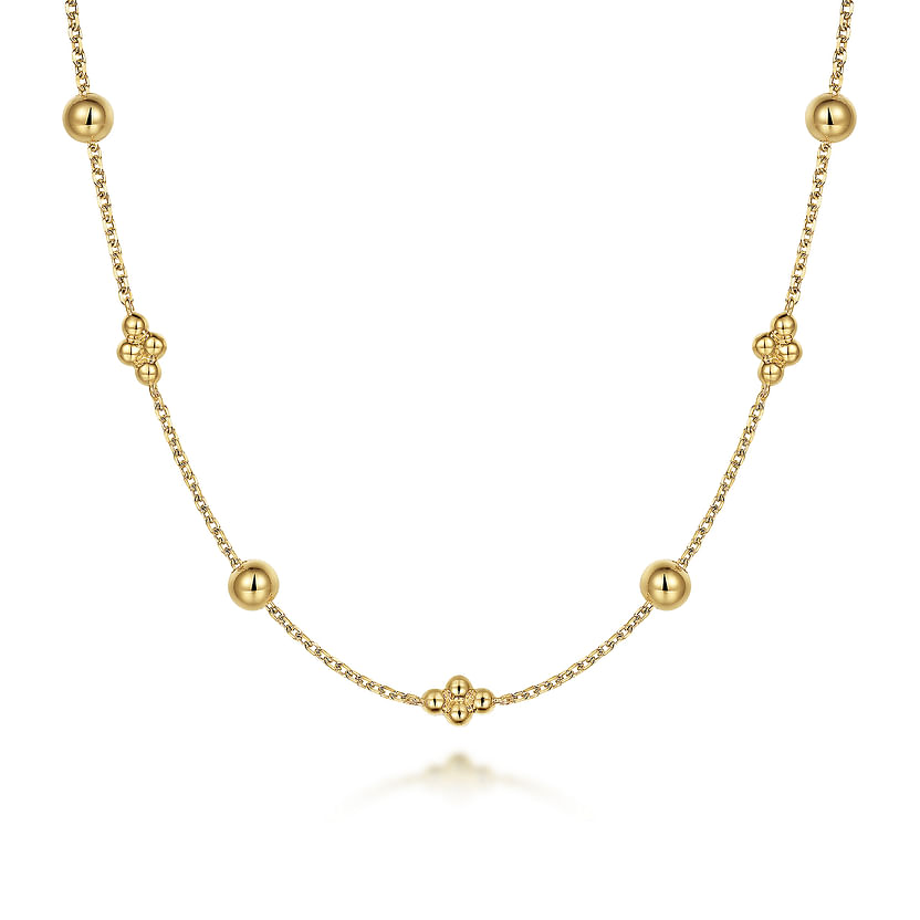 The 14K Yellow Gold Bujukan Bead Station Necklace by Gabriel & Co features evenly spaced beads and floral-inspired clusters for an elegant, minimalist look.