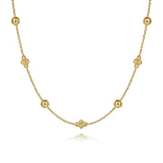 The 14K Yellow Gold Bujukan Bead Station Necklace by Gabriel & Co features evenly spaced beads and floral-inspired clusters for an elegant, minimalist look.