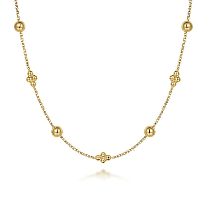 The 14K Yellow Gold Bujukan Bead Station Necklace by Gabriel & Co features evenly spaced beads and floral-inspired clusters for an elegant, minimalist look.