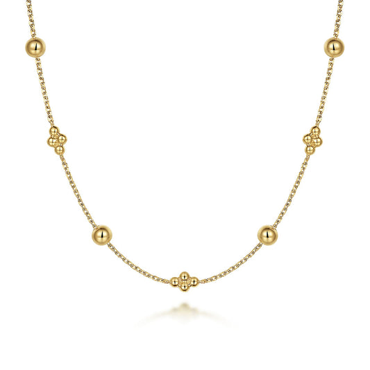 The 14K Yellow Gold Bujukan Bead Station Necklace by Gabriel & Co features evenly spaced beads and floral-inspired clusters for an elegant, minimalist look.