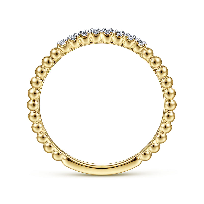 The Gabriel & Co 14K Yellow Gold Bujukan Bead and Diamond Stackable Ring features a beaded band and a row of small round diamonds along the top, shown on a white background.