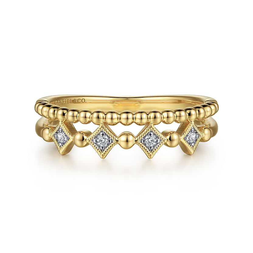 The Gabriel & Co 14K Yellow Gold Bujukan Diamond Easy Stackable Ring showcases a beaded band with gold-framed square diamond settings, offering an elegant and intricate stackable design.