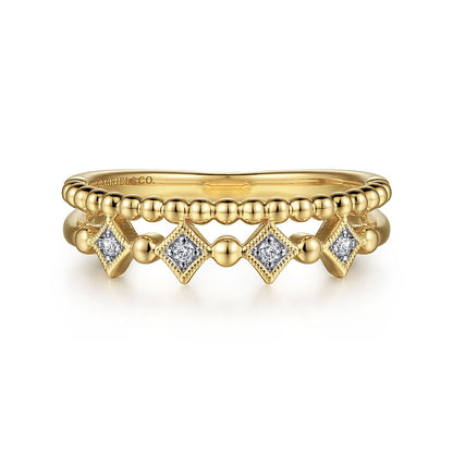 The Gabriel & Co 14K Yellow Gold Bujukan Diamond Easy Stackable Ring showcases a beaded band with gold-framed square diamond settings, offering an elegant and intricate stackable design.