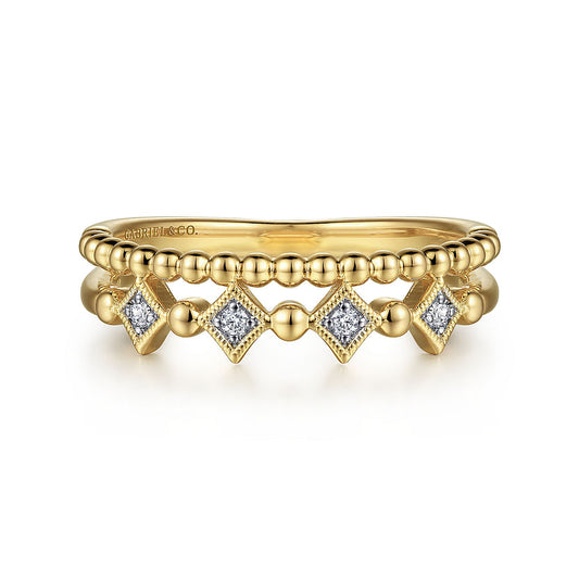The Gabriel & Co 14K Yellow Gold Bujukan Diamond Easy Stackable Ring showcases a beaded band with gold-framed square diamond settings, offering an elegant and intricate stackable design.