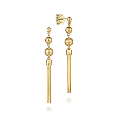 The Gabriel & Co 14K Yellow Gold Bujukan Drop Earrings showcase polished gold spheres and beaded accents stacked above sleek bars for a modern, elegant linear look.
