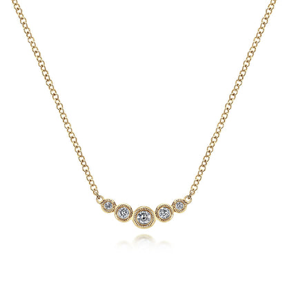 The Gabriel & Co 14K Yellow Gold Curved Diamond Bar Necklace features five bezel-set diamonds in a gentle curve, with a larger center stone for vintage charm on a classic white background.