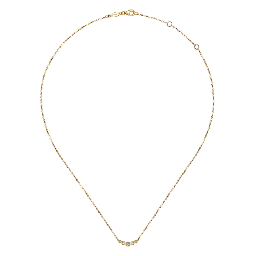 The Gabriel & Co 14K Yellow Gold Curved Diamond Bar Necklace features five round diamonds set along a delicate chain for a timeless, vintage-inspired look.